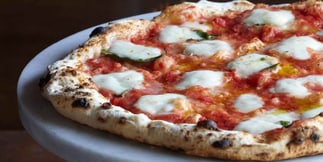 Chips, Spins and a Slice: Which Casinos Serve the Best Pizza in Las Vegas?