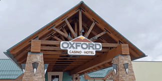 Churchill Downs' Oxford Casino Sues Maine Over Exclusive Tribal iGaming Bill