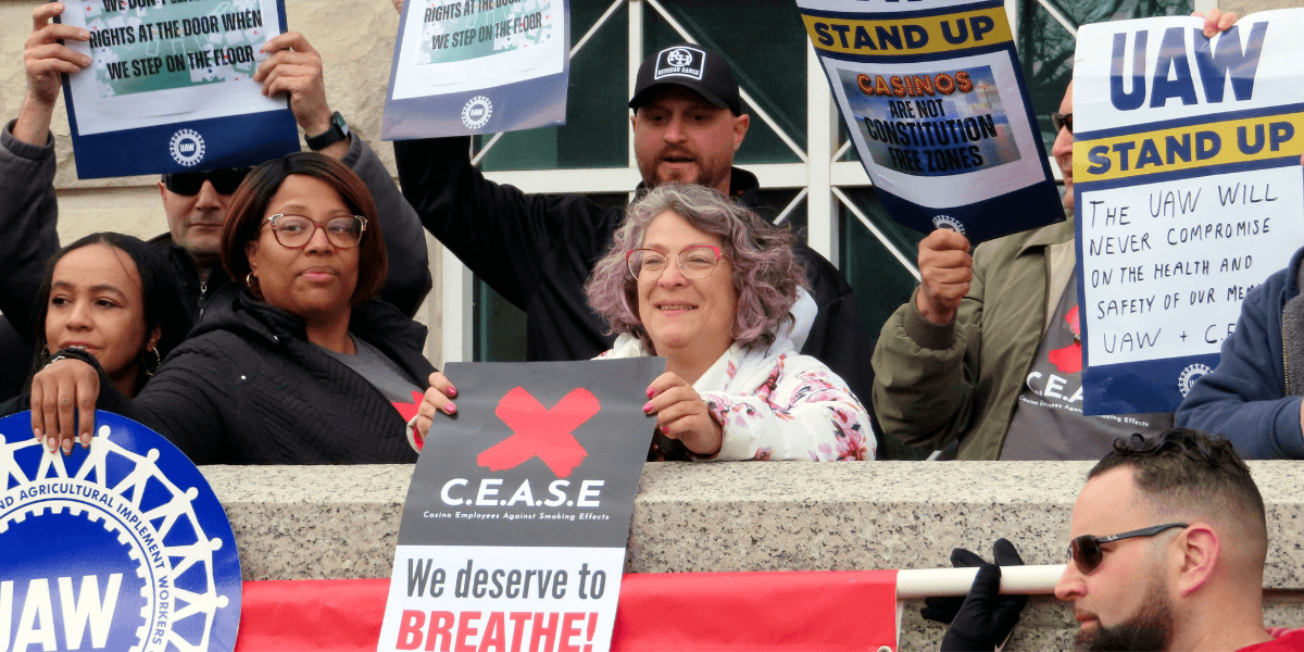 Atlantic City casino workers hold signs during rally