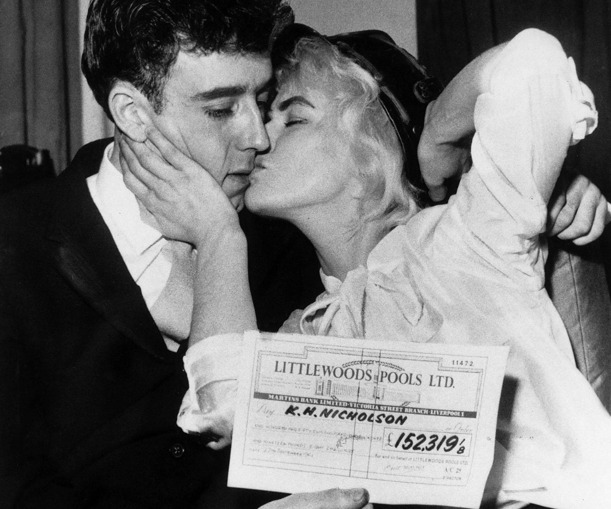 Keith and Viviene Nicholson Celebrate Their Win in in 1961